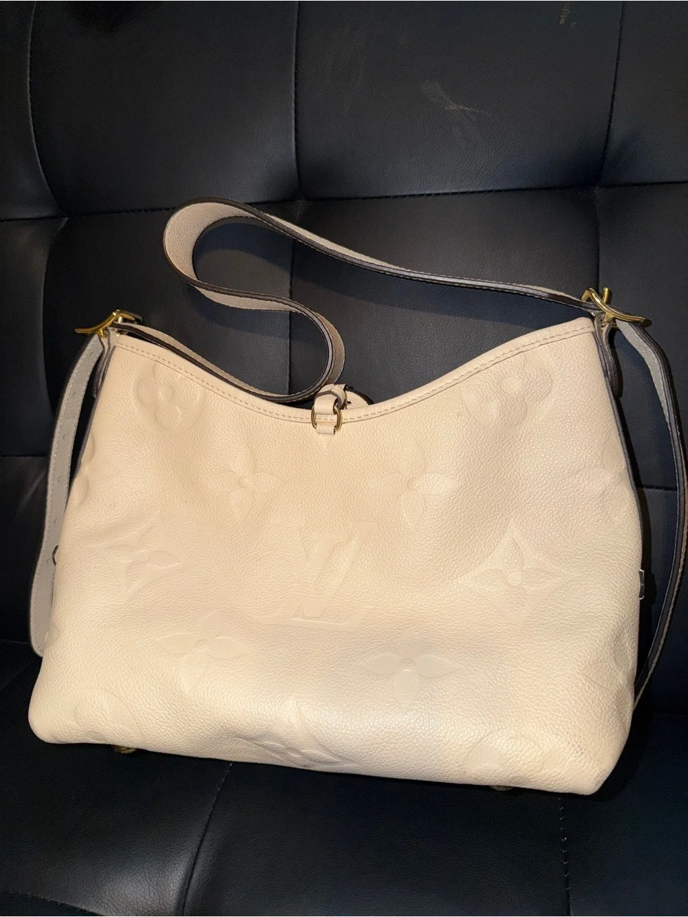 Louis Vuitton Cream Embossed Monogram carry all Bag with Gold Hardware